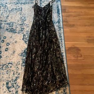 Black and gold lace floor length dress